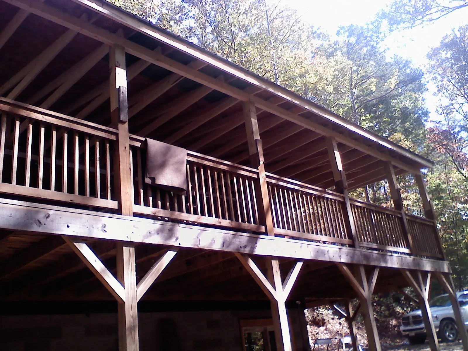 Timber framing under a new elevated porch and deck — Roof Leak Repair in Edinburg by Roofing Brothers